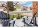 Relaxing view of a neighborhood street from a cozy front porch, perfect for enjoying the outdoors at 8827 Cactus Flower Way, Highlands Ranch, CO 80126