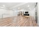 Spacious basement features wood floors, wet bar, and media center, perfect for entertaining or relaxing at 4960 Malaya St, Denver, CO 80249