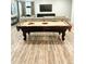 Finished basement with stylish pool table and media center offering a great space for recreation at 4960 Malaya St, Denver, CO 80249