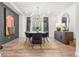 Refined dining room with modern lighting, a stylish table, and elegant decor for sophisticated entertaining and Gathering dinners at 4960 Malaya St, Denver, CO 80249