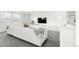 Bright living area features large white sofa and built-in storage along one wall at 4960 Malaya St, Denver, CO 80249