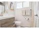 Clean bathroom with modern vanity and shower at 1488 S Fairfax St, Denver, CO 80222