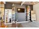 Bedroom with dark gray accent wall and built-in shelving at 1488 S Fairfax St, Denver, CO 80222