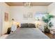 Spacious bedroom with plenty of natural light and built in shelving at 1488 S Fairfax St, Denver, CO 80222