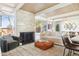 Bright living room featuring a fireplace and sliding glass doors to backyard at 1488 S Fairfax St, Denver, CO 80222