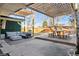 Outdoor patio with pergola, seating area, and dining table at 1488 S Fairfax St, Denver, CO 80222