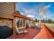 Spacious deck with outdoor seating, perfect for entertaining and enjoying the backyard view at 9745 Derby Way, Parker, CO 80134