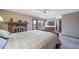 Bright and airy main bedroom featuring a fireplace and access to the private balcony at 9745 Derby Way, Parker, CO 80134