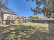 Large backyard featuring a sunroom and deck ideal for Gathering gatherings and outdoor living at 11002 E Ohio Pl, Aurora, CO 80012