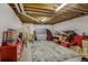 Spacious basement with exposed beams and ample storage, ready for customization at 5457 S Valdai St, Aurora, CO 80015