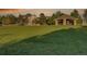 A grassy park with mature trees and gazebo at 5457 S Valdai St, Aurora, CO 80015