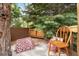 Inviting backyard deck with comfortable pillows and cushioned seating at 7770 S Ivy Way, Centennial, CO 80112