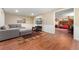Spacious basement with a cozy seating area and adjacent bunk room at 7770 S Ivy Way, Centennial, CO 80112