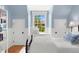 Bright bedroom with a view, featuring two closets and built-in window seat at 7770 S Ivy Way, Centennial, CO 80112