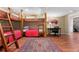Bedroom with a wooden bunk bed and desk area at 7770 S Ivy Way, Centennial, CO 80112