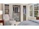 Bedroom closets featuring great storage space and natural light from the window at 7770 S Ivy Way, Centennial, CO 80112