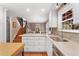 Kitchen features stainless sink and appliances, light countertops, and an open concept at 7770 S Ivy Way, Centennial, CO 80112
