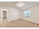 Bright bedroom featuring neutral carpet, white walls, a window and closet with doors at 10340 Winona Ct, Westminster, CO 80031