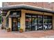 Urban Dogg pet supply store with a brick facade and window displays at 1747 N Washington St # C303, Denver, CO 80203