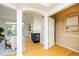 Open living room features a fireplace, light hardwood floors, and lots of natural light from the sliding glass doors at 1747 N Washington St # C303, Denver, CO 80203