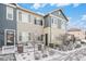 Charming two-story townhouse with a picket fence and well-maintained front yard at 15550 W 64Th Pl # D, Arvada, CO 80007