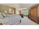 Expansive main bedroom shows a large bed, vaulted ceilings, and plenty of space at 4545 S Monaco St # 114, Denver, CO 80237