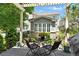 Charming patio with a pergola, ideal for enjoying outdoor meals and relaxing while looking at the well-maintained backyard at 4545 S Monaco St # 114, Denver, CO 80237