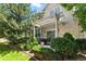 Beautiful patio with a pergola, perfect for outdoor dining and relaxation, plus a well-maintained yard with mature trees at 4545 S Monaco St # 114, Denver, CO 80237
