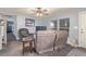 Spacious living room with comfortable seating and natural light from the windows at 8400 Adams Way, Denver, CO 80229