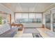 Bright sunroom with large windows, offering a peaceful area for relaxation and enjoyment at 8400 Adams Way, Denver, CO 80229