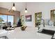 Bright, open kitchen with stainless steel sink, island seating and beautiful views at 11760 Baca Rd, Conifer, CO 80433