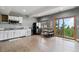 Spacious kitchen with stainless steel appliances, an eating area and sliding doors to the outdoors at 11760 Baca Rd, Conifer, CO 80433