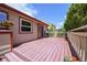 Inviting back deck with access to the home, perfect for outdoor entertaining and relaxation at 5554 S Ward Way, Littleton, CO 80127