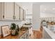 Stylish kitchen with modern appliances, granite countertops, and an open floor plan at 5554 S Ward Way, Littleton, CO 80127
