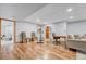 Versatile basement space with hardwood floors and room for exercise equipment or a home office at 11820 W 66Th Pl # C, Arvada, CO 80004