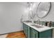 Updated bathroom with dual sinks and lots of natural light at 11820 W 66Th Pl # C, Arvada, CO 80004