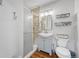 Bathroom featuring glass enclosed shower and sink vanity at 11820 W 66Th Pl # C, Arvada, CO 80004