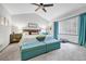 Spacious bedroom with vaulted ceiling, lots of light, and stylish furniture at 11820 W 66Th Pl # C, Arvada, CO 80004