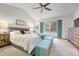 Cozy bedroom with lots of natural light and calming decor at 11820 W 66Th Pl # C, Arvada, CO 80004