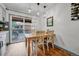 Cozy dining area with sliding doors to outdoor patio at 11820 W 66Th Pl # C, Arvada, CO 80004