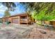 Exterior of home with two-car garage and private backyard at 11820 W 66Th Pl # C, Arvada, CO 80004