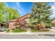 Attractive two-story home with well-maintained landscaping and mature trees at 11820 W 66Th Pl # C, Arvada, CO 80004