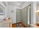 Inviting foyer with wood flooring, multiple doors, overhead lighting, and stylish decor at 11820 W 66Th Pl # C, Arvada, CO 80004
