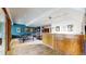 Finished basement featuring recreational area with ping pong and unique comic-themed decor at 10346 E Crestridge Ln, Englewood, CO 80111