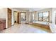 Open bathroom featuring a soaking tub, glass shower, and vanity at 10346 E Crestridge Ln, Englewood, CO 80111