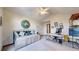 Versatile office space with a daybed, desk, and ample storage, perfect for a home office or den at 10346 E Crestridge Ln, Englewood, CO 80111