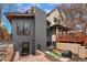 Contemporary home with a spacious backyard, patio, and outdoor seating area at 1675 S Steele St, Denver, CO 80210