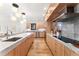 Well-designed kitchen with sleek cabinetry, stainless steel appliances, and a spacious layout perfect for culinary enthusiasts at 1675 S Steele St, Denver, CO 80210