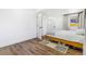 Bright bedroom featuring hardwood floors and a light gray bedspread at 9093 Dudley St, Westminster, CO 80021