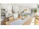 Bright, open-concept living space featuring modern finishes and ample natural light, plus an eat in kitchen at 9093 Dudley St, Westminster, CO 80021